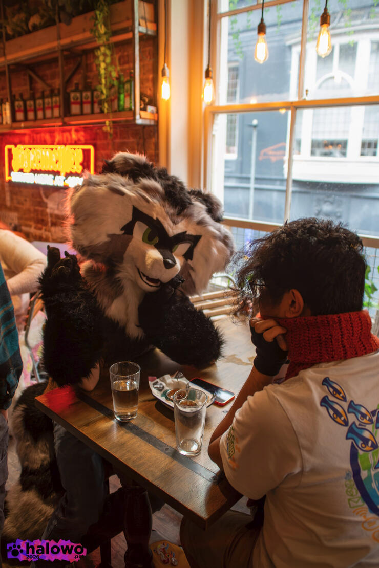 Redbridge sat at a table with magicalbunny31, presumably on a date Redbridge sat at a table with magicalbunny31, presumably on a date