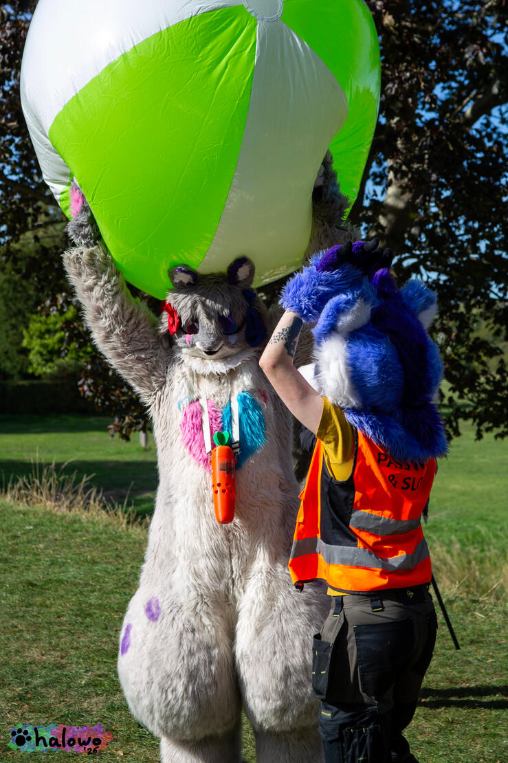 Hino holding a comically large beach ball Hino holding a comically large beach ball